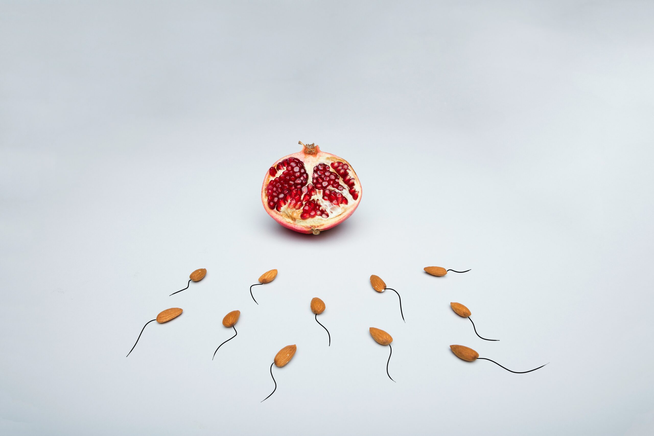 sexual health imagery represented by red fruit with white background